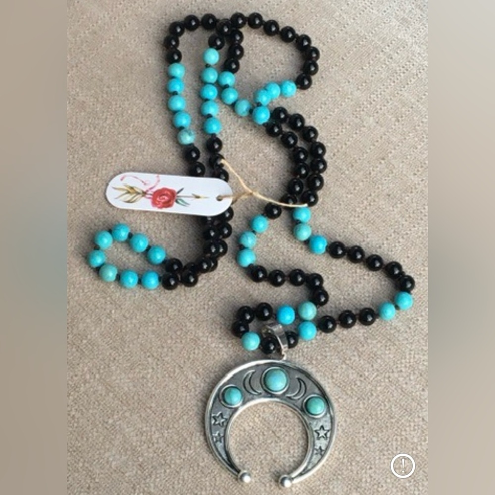 New black and turquoise beaded necklace with silver crescent moon stars pendant